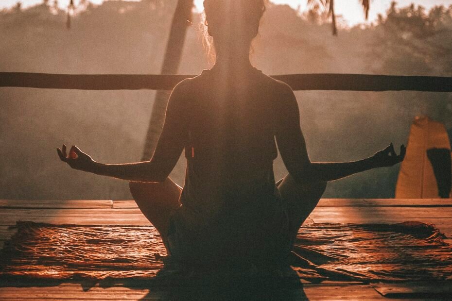 A yoga session in a peaceful natural setting representing wellness retreats in Rishikesh.