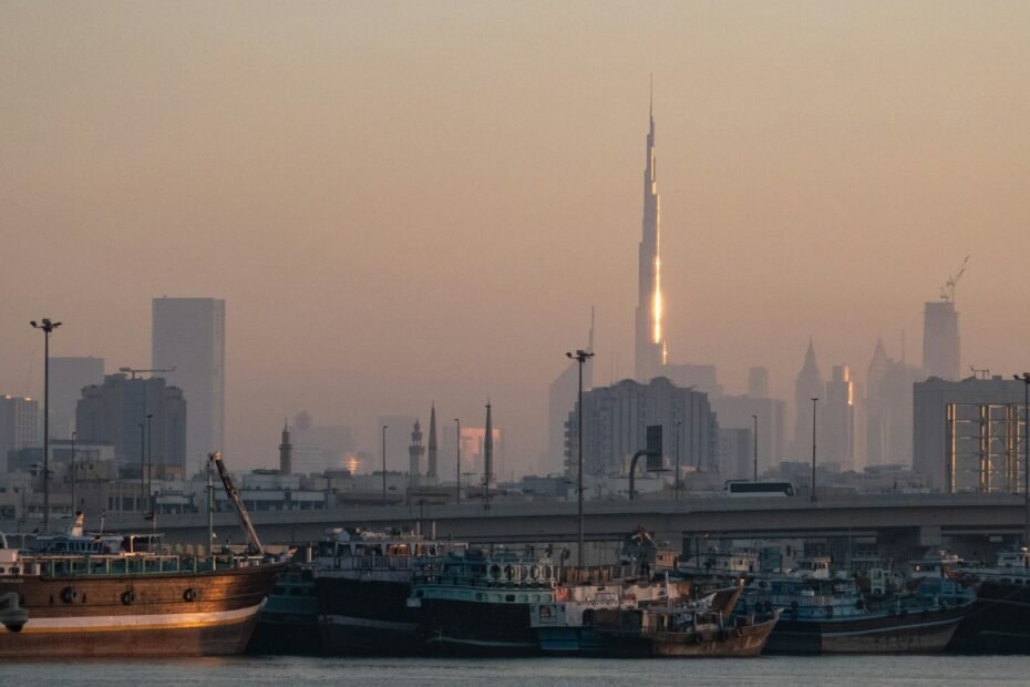 Dubai skyline at sunset with the Burj Khalifa, illustrating a seven-day Dubai itinerary from India.