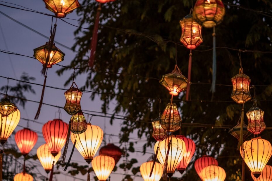 Traditional lanterns glowing in Hoi An for a Vietnam travel itinerary